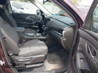 2019 Chevrolet Traverse LT Cloth z VIN 1GNEVGKW7KJ248073, wystawiony jako IAAI lot #42362893 z przebiegiem 56 232 mil mil oraz . Historia ofert i sprzedaży dostępna na DreamBid. Obrazek 5.
