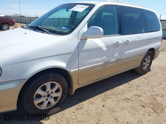2004 Kia Sedona LX with VIN KNDUP131646596077, listed as a IAAI auction lot 41772025 with 236,282 mi miles. Bid and sale history available at carsss.com. Image 6.