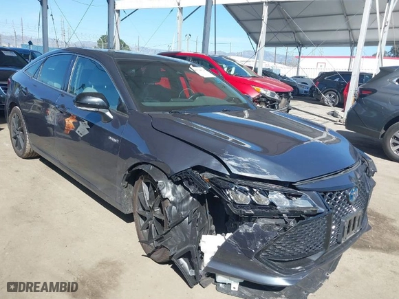 2019 Toyota Avalon Hybrid Limited with VIN 4T1B21FB9KU004539, listed as a IAAI auction lot 41784328 with 99,811 mi miles. Bid and sale history available at carsss.com. Image 1.