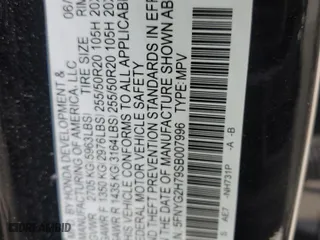 2025 Honda Pilot Touring with VIN 5FNYG2H79SB007996, listed as a Copart auction lot 49767095 with 15,894 mi miles and Salvage Title. Bid and sale history available at carsss.com. Image 14.