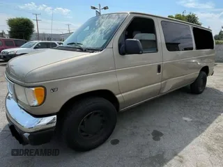 1999 Ford Econoline Passenger XL with VIN 1FMRE11L6XHB70992, listed as a Copart auction lot 78546004 with 264,378 mi miles and Clean title. Bid and sale history available at DreamBid. Image 2.