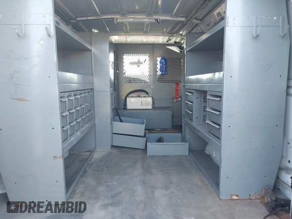 2008 Ford Econoline Cargo Commercial with VIN 1FTNE24L78DB58458, listed as a IAAI auction lot 41969371 with 133,399 mi miles and . Bid and sale history available at DreamBid. Image 13.