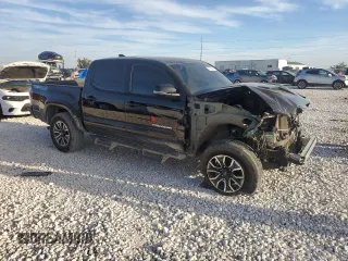 2023 Toyota Tacoma 4WD SR with VIN 3TYCZ5AN0PT110522, listed as a Copart auction lot 82789424 with 45,115 mi miles and Salvage Title. Bid and sale history available at carsss.com. Image 4.