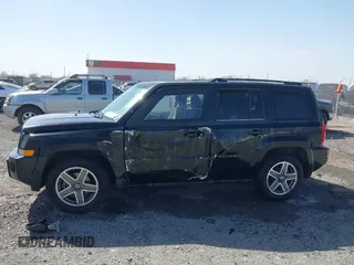 2009 Jeep Patriot Sport z VIN 1J4FF28B19D237025, wystawiony jako IAAI lot #41828514 z przebiegiem 141 410 mil mil oraz . Historia ofert i sprzedaży dostępna na DreamBid. Obrazek 14.