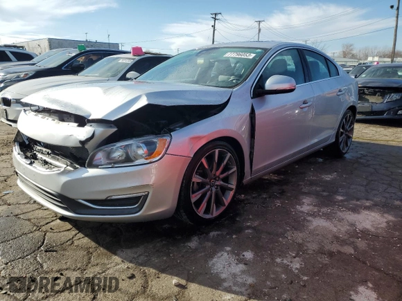 2015 Volvo S60 T5 Drive-E Premier with VIN YV140MFKXF2353290, listed as a Copart auction lot 77796053 with 51,829 mi miles. Bid and sale history available at carsss.com. Image 1.