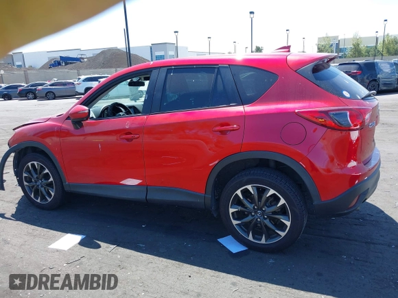 2016 Mazda CX-5 Grand Touring z VIN JM3KE2DY2G0660385, wystawiony jako IAAI lot #42101004 z przebiegiem 166 336 mil mil oraz . Historia ofert i sprzedaży dostępna na DreamBid. Obrazek 15.