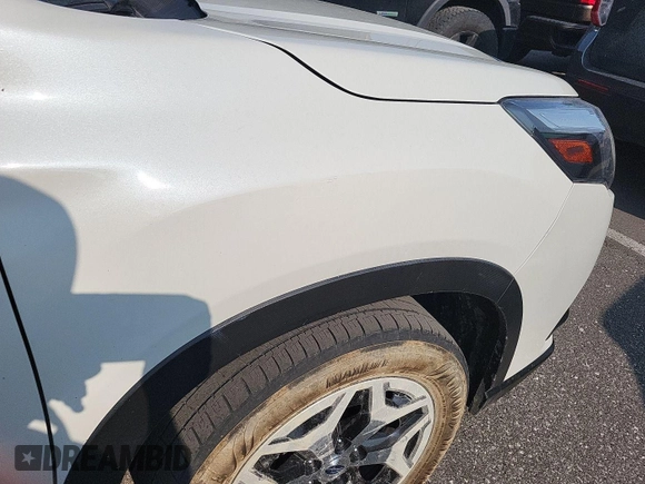 2023 Subaru Forester Premium with VIN JF2SKAEC1PH494927, listed as a IAAI auction lot 42566378 with 77,411 mi miles and . Bid and sale history available at DreamBid. Image 13.