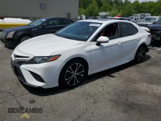 2018 Toyota Camry LE z VIN 4T1B11HK7JU610467, wystawiony jako Copart lot #58297845 z przebiegiem 87 152 mil mil oraz Szkoda całkowita • Salvage title. Historia ofert i sprzedaży dostępna na DreamBid. Obrazek 1.