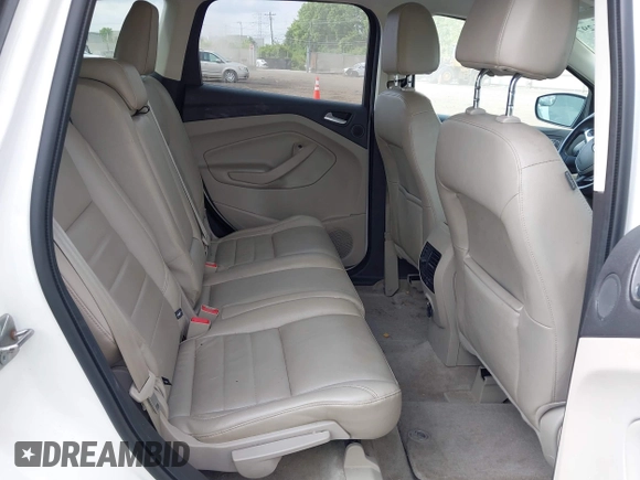 2013 Ford Escape SEL with VIN 1FMCU9HX6DUB14053, listed as a IAAI auction lot 42361297 with 144,861 mi miles and . Bid and sale history available at DreamBid. Image 8.