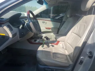 2008 Hyundai Azera Limited с VIN KMHFC46F98A303977, выставлен на аукционе Copart как лот 62328645 с пробегом 220 663 миль миль и Списание • Salvage title. История ставок и продаж доступна на DreamBid. Изображение 7.