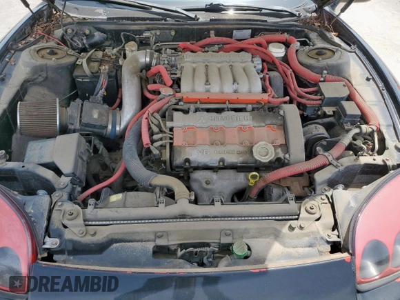 1999 Mitsubishi 3000GT z VIN JA3AM44H6XY002443, wystawiony jako Copart lot #57155505 z przebiegiem 201 588 mil mil oraz Czysty tytuł • Clean title. Historia ofert i sprzedaży dostępna na DreamBid. Obrazek 11.