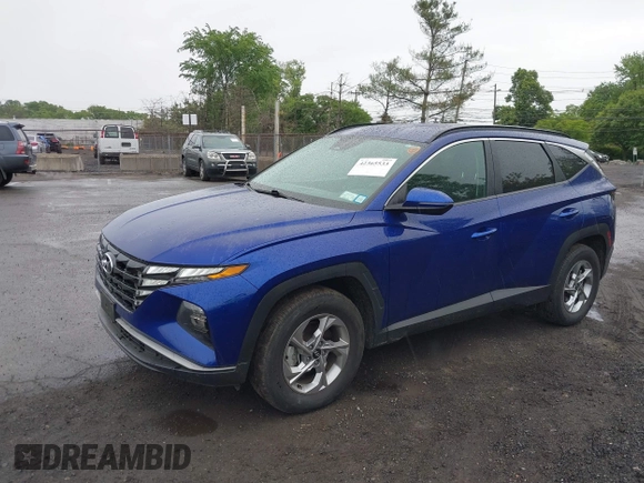 2022 Hyundai Tucson SEL z VIN 5NMJBCAE1NH026298, wystawiony jako IAAI lot #42365533 z przebiegiem 44 080 mil mil oraz . Historia ofert i sprzedaży dostępna na DreamBid. Obrazek 17.