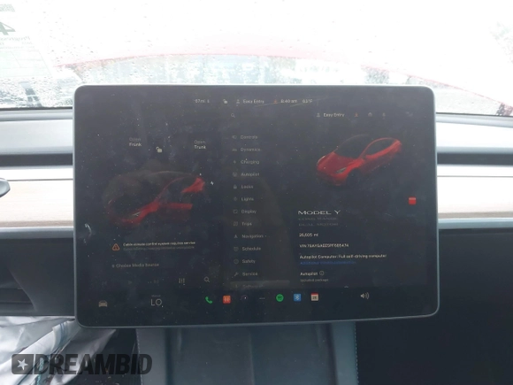 2023 Tesla Model Y Long Range with VIN 7SAYGAEE5PF685474, listed as a IAAI auction lot 40348773 with 26,605 mi miles and . Bid and sale history available at DreamBid. Image 18.