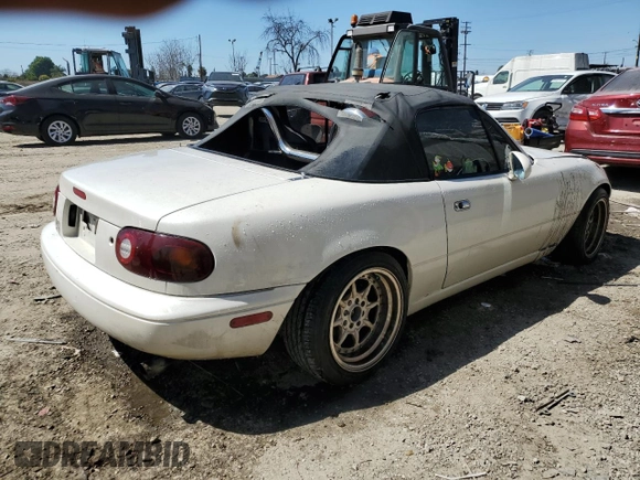 1990 Mazda MX-5 Miata z VIN JM1NA3511L0106323, wystawiony jako Copart lot #50449685 z przebiegiem 179 018 mil mil oraz Szkoda całkowita • Salvage title. Historia ofert i sprzedaży dostępna na DreamBid. Obrazek 3.