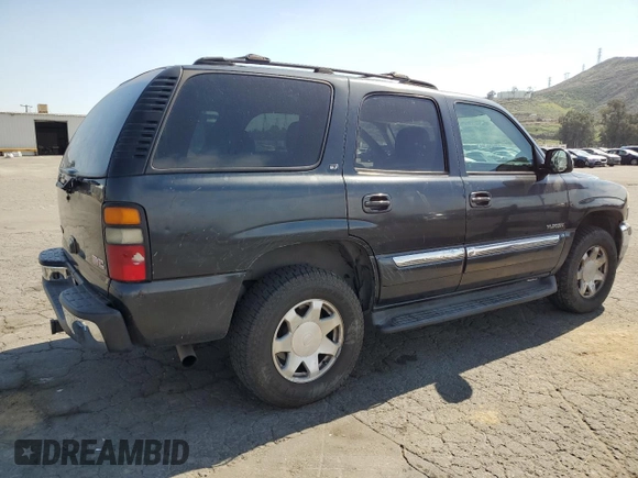 2004 GMC Yukon SLT with VIN 1GKEC13T54R296969, listed as a Copart auction lot 52738825 with 185,049 mi miles and Salvage Title. Bid and sale history available at carsss.com. Image 3.