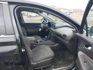 2019 Hyundai Santa Fe SE with VIN 5NMS2CAD7KH070703, listed as a IAAI auction lot 41721033 with 110,313 mi miles. Bid and sale history available at carsss.com. Image 5.