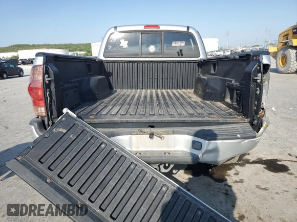 2007 Toyota Tacoma z VIN 5TEMU52N27Z381856, wystawiony jako Copart lot #52943985 z przebiegiem 241 481 mil mil oraz Szkoda całkowita • Salvage title. Historia ofert i sprzedaży dostępna na DreamBid. Obrazek 6.