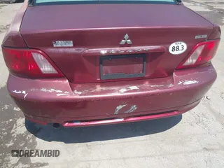 2003 Mitsubishi Galant ES z VIN 4A3AA46G83E216938, wystawiony jako IAAI lot #42191226 z przebiegiem Nie podano mil oraz . Historia ofert i sprzedaży dostępna na DreamBid. Obrazek 6.