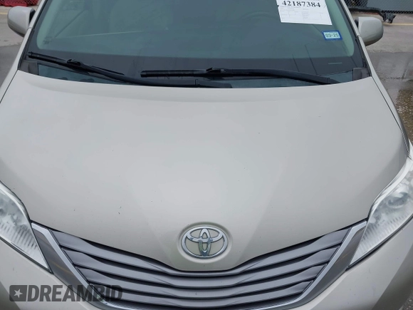 2015 Toyota Sienna XLE with VIN 5TDYK3DCXFS578888, listed as a IAAI auction lot 42187384 with 105,287 mi miles and . Bid and sale history available at DreamBid. Image 6.