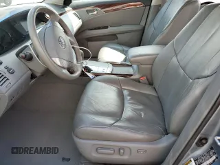 2010 Toyota Avalon XL with VIN 4T1BK3DB3AU357047, listed as a Copart auction lot 52694255 with 130,749 mi miles and Salvage Title. Bid and sale history available at carsss.com. Image 7.