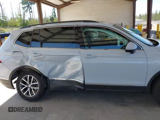 2018 Volkswagen Tiguan SEL z VIN 3VV2B7AX0JM197274, wystawiony jako IAAI lot #42392421 z przebiegiem 45 453 mil mil oraz . Historia ofert i sprzedaży dostępna na DreamBid. Obrazek 13.