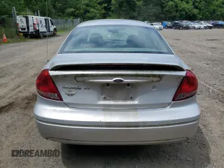 2004 Ford Taurus SE с VIN 1FAFP53204G153125, выставлен на аукционе Copart как лот 63232325 с пробегом 90 885 миль миль и Чистый • Clean title. История ставок и продаж доступна на DreamBid. Изображение 6.
