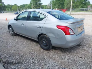 2014 Nissan Versa SV with VIN 3N1CN7APXEK453063, listed as a IAAI auction lot 42163061 with 176,437 mi miles. Bid and sale history available at carsss.com. Image 3.