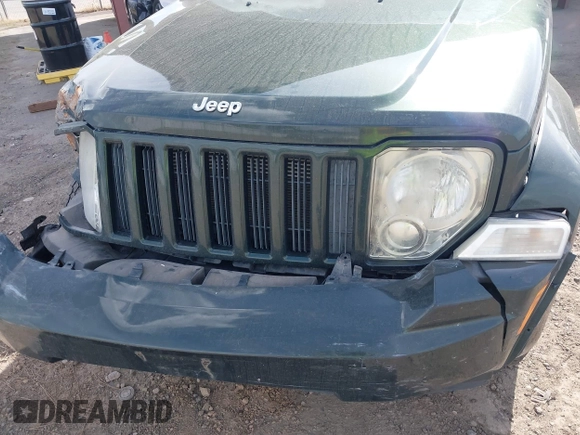 2011 Jeep Liberty Sport 70th Anniversary with VIN 1J4PN2GK8BW568560, listed as a IAAI auction lot 41904298 with 122,727 mi miles and . Bid and sale history available at DreamBid. Image 6.