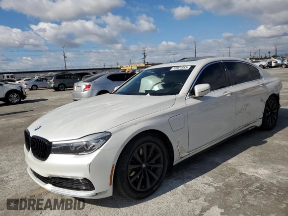 2018 BMW 7 Series 740e xDrive iPerformance with VIN WBA7J2C51JG938111, listed as a Copart auction lot 73361933 with 104,641 mi miles. Bid and sale history available at carsss.com. Image 1.