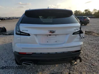 2022 Cadillac XT4 FWD Sport with VIN 1GYFZER48NF169913, listed as a Copart auction lot 84457034 with 36,406 mi miles and Clean title. Bid and sale history available at DreamBid. Image 6.