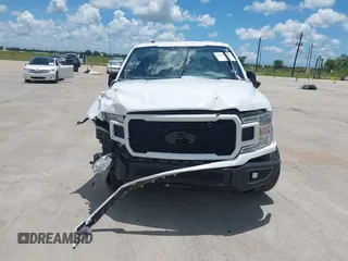 2019 Ford F-150 XL with VIN 1FTEW1CP5KKE62001, listed as a IAAI auction lot 42611277 with 207,262 mi miles and . Bid and sale history available at DreamBid. Image 12.