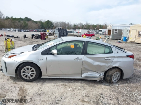 2021 Toyota Prius L Eco with VIN JTDKAMFU1M3152848, listed as a IAAI auction lot 41600212 with 140,114 mi miles. Bid and sale history available at carsss.com. Image 13.