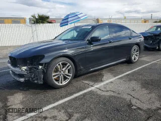2017 BMW 7 Series 740i with VIN WBA7E2C59HG739693, listed as a Copart auction lot 42599835 with 90,061 mi miles and Salvage Title. Bid and sale history available at carsss.com. Image 1.