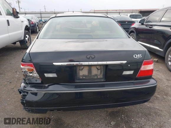 1999 Infiniti Q45 z VIN JNKBY31A3XM602466, wystawiony jako IAAI lot #41721377 z przebiegiem 113 158 mil mil oraz . Historia ofert i sprzedaży dostępna na DreamBid. Obrazek 16.