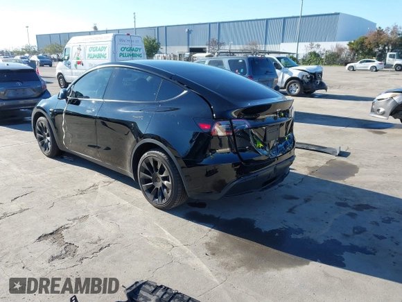 2024 Tesla Model Y Long Range with VIN 7SAYGDEEXRF983040, listed as a IAAI auction lot 41555332 with 79,506 mi miles and . Bid and sale history available at DreamBid. Image 3.