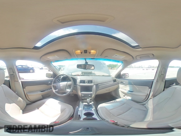 2010 Ford Fusion Hybrid z VIN 3FADP0L33AR267806, wystawiony jako Copart lot #55952815 z przebiegiem 146 912 mil mil oraz Szkoda całkowita • Salvage title. Historia ofert i sprzedaży dostępna na DreamBid. Obrazek 14.