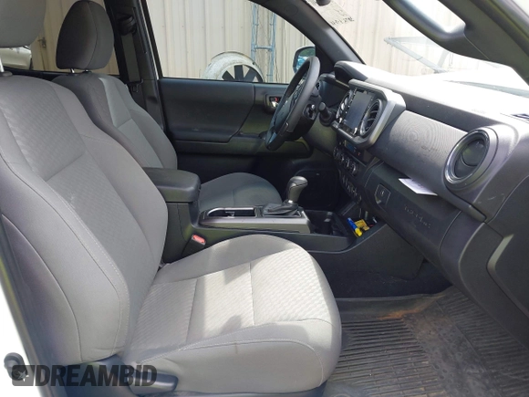 2023 Toyota Tacoma SR with VIN 3TMCZ5AN7PM639378, listed as a IAAI auction lot 42222407 with 38,172 mi miles and . Bid and sale history available at DreamBid. Image 5.