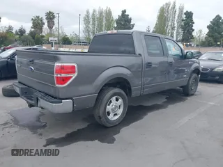 2011 Ford F-150 XLT with VIN 1FTFW1CT8BKD21411, listed as a IAAI auction lot 42077959 with 152,665 mi miles. Bid and sale history available at carsss.com. Image 4.