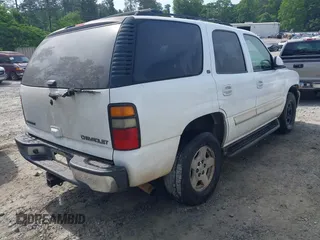 2005 Chevrolet Tahoe Z71 with VIN 1GNEC13T45R101304, listed as a IAAI auction lot 42229835 with 318,175 mi miles and . Bid and sale history available at DreamBid. Image 4.