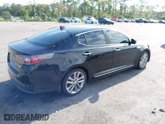 2015 Kia Optima EX with VIN KNAGN4AD7F5090393, listed as a IAAI auction lot 42632332 with 205,227 mi miles and . Bid and sale history available at DreamBid. Image 4.