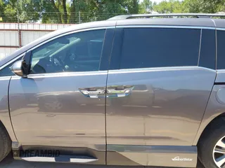 2015 Honda Odyssey Touring Elite z VIN 5FNRL5H99FB017517, wystawiony jako IAAI lot #42246066 z przebiegiem 104 878 mil mil oraz . Historia ofert i sprzedaży dostępna na DreamBid. Obrazek 14.