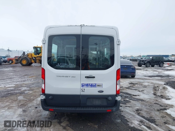 2018 Ford Transit XL z VIN 1FDZX2CM7JKA52904, wystawiony jako IAAI lot #41677165 z przebiegiem 15 201 mil mil oraz . Historia ofert i sprzedaży dostępna na DreamBid. Obrazek 16.