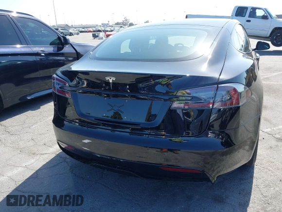 2022 Tesla Model S with VIN 5YJSA1E5XNF467435, listed as a IAAI auction lot 42538706 with 26,504 mi miles and . Bid and sale history available at DreamBid. Image 16.