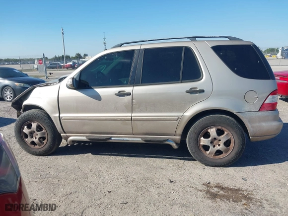 2003 Mercedes-Benz M-Class 3.7L with VIN 4JGAB57E23A453057, listed as a IAAI auction lot 41704721 with 190,649 mi miles. Bid and sale history available at carsss.com. Image 14.
