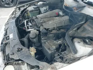 2002 Mercedes-Benz C AMG z VIN WDBRF65JX2F222750, wystawiony jako IAAI lot #42517552 z przebiegiem 203 533 mil mil oraz . Historia ofert i sprzedaży dostępna na DreamBid. Obrazek 12.