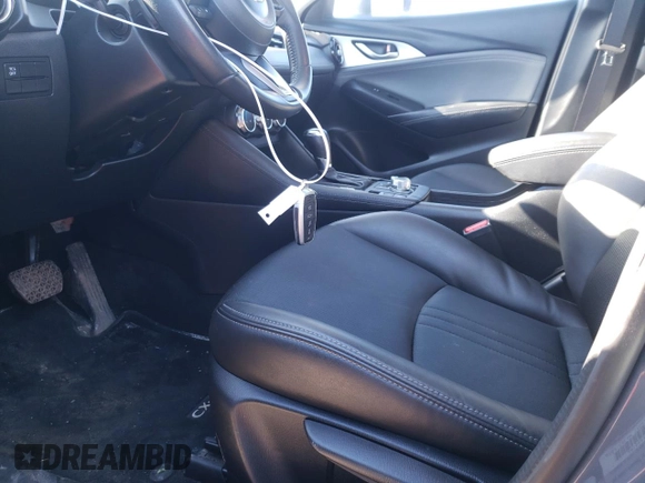 2021 Mazda CX-3 Touring z VIN JM1DKFC78M1508479, wystawiony jako Copart lot #61866195 z przebiegiem 73 746 mil mil oraz Szkoda całkowita • Salvage title. Historia ofert i sprzedaży dostępna na DreamBid. Obrazek 7.