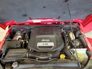 2016 Jeep Wrangler Unlimited Sahara z VIN 1C4BJWEG9GL219739, wystawiony jako Copart lot #59686315 z przebiegiem 59 242 mil mil oraz Szkoda całkowita • Salvage title. Historia ofert i sprzedaży dostępna na DreamBid. Obrazek 12.