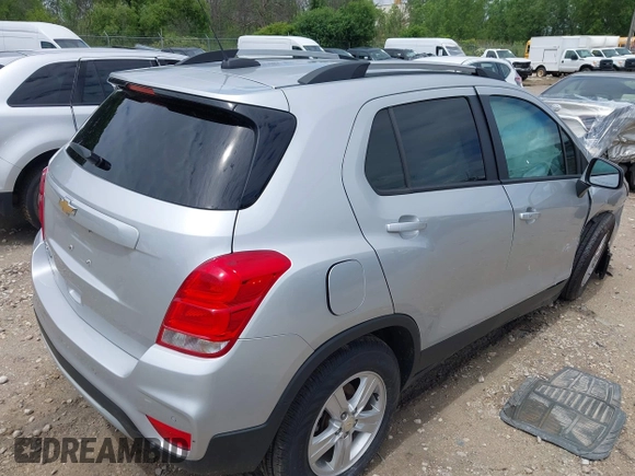 2021 Chevrolet Trax LT with VIN KL7CJPSM5MB364683, listed as a IAAI auction lot 42613395 with 48,047 mi miles and . Bid and sale history available at DreamBid. Image 4.