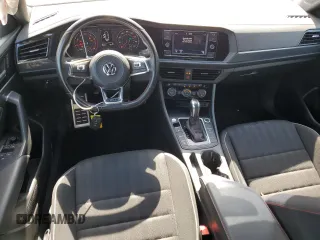 2021 Volkswagen Jetta GLI S z VIN 3VW6T7BU7MM021776, wystawiony jako Copart lot #55020415 z przebiegiem 61 456 mil mil oraz Nie do naprawy. Historia ofert i sprzedaży dostępna na DreamBid. Obrazek 8.