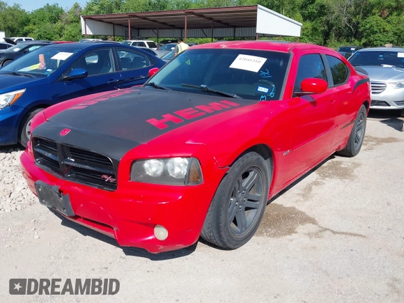 2006 Dodge Charger R/T with VIN 2B3KA53H36H500082, listed as a IAAI auction lot 42041310 with 216,989 mi miles and . Bid and sale history available at carsss.com. Image 2.